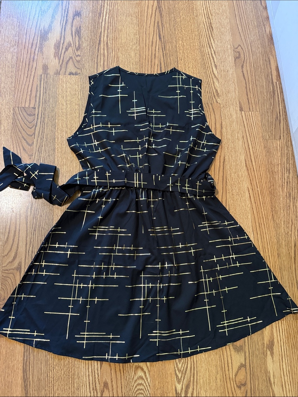 Black Dress with Gold Graphic Lines